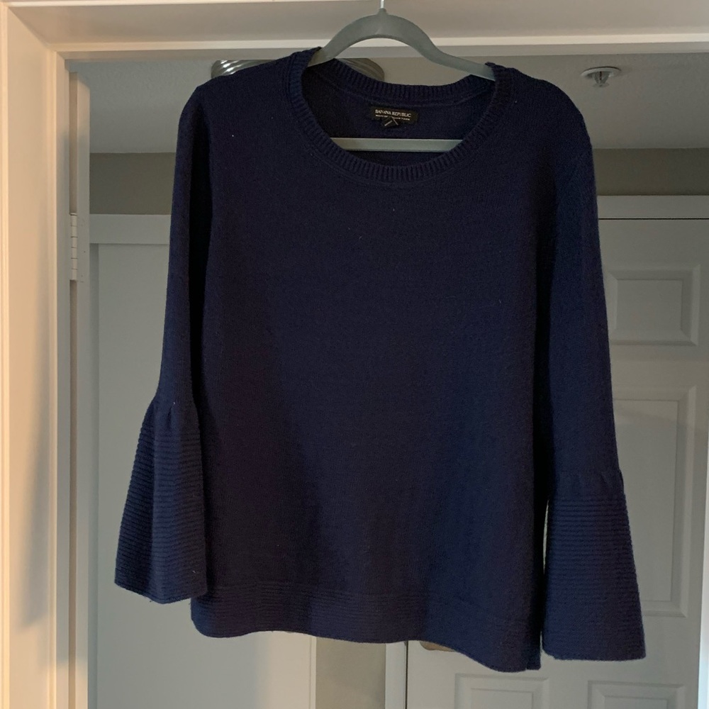 Blue bell sleeved sweater.